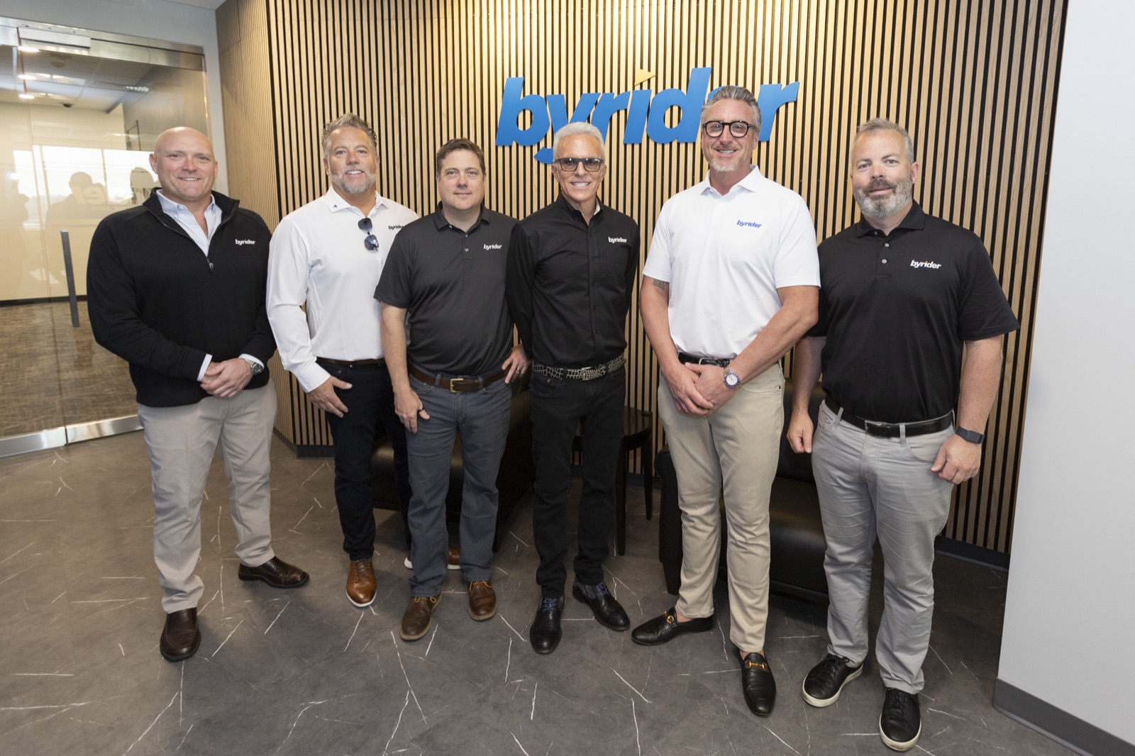 Six Byrider franchisee owners standing together