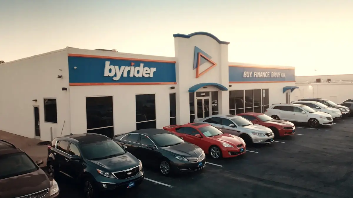 Byrider dealership exterior with vehicles on the lot